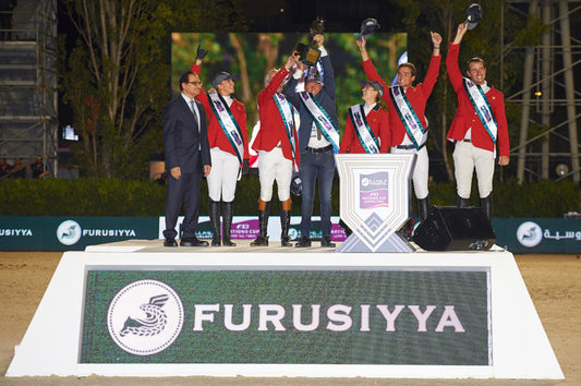 Melchior on the podium with her teammates in Barcelona. ph. Herve Bonnaud