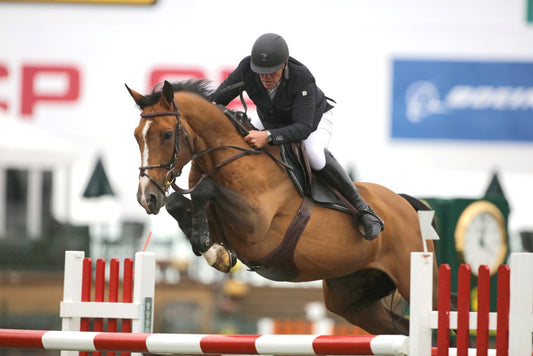 Roger-Yves Bost of FRA riding Quod'Coeur De La Loge. Ph. Spruce Meadows Media Services