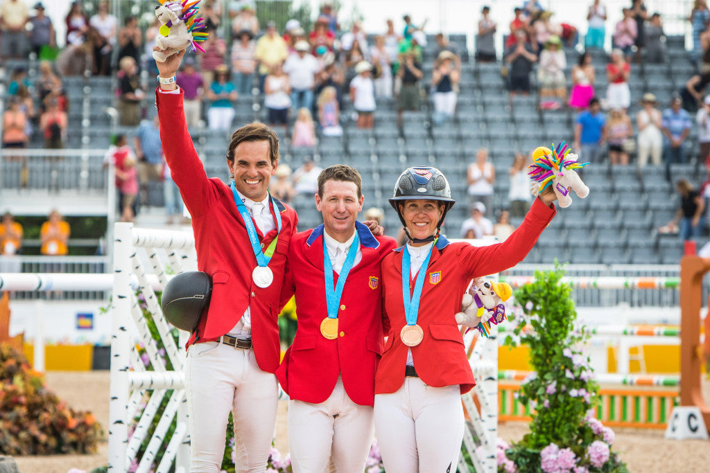 Andres Rodriguez (VEN), Mclain Ward (USA) and Lauren Hough (USA) ,individual medalists for Show Jumping on the podium at the OLG Caledon Pan Am Equestrian Park during the Toronto 2015 Pan American Games in Caledon, Ontario, Canada.