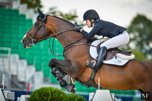 Katie Dinan & Amaretto D'Arco compete at LGCT London 2015.