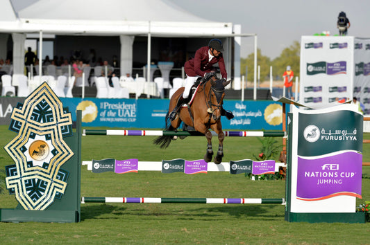 Sheikh Khalid Bin Ali Al Thani riding Vienna Olympic