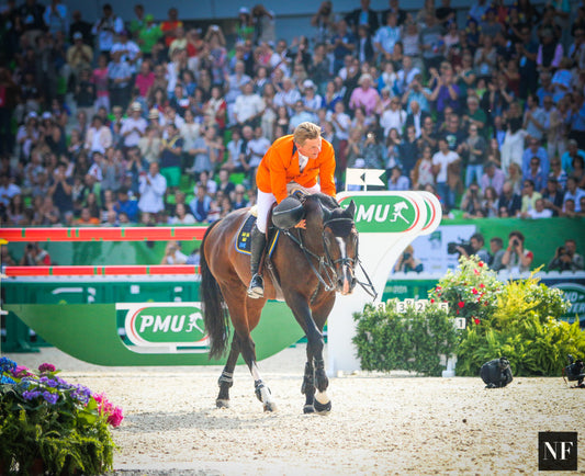 Jeroen Dubbledam with Rolf-Goran Bengtsson's mount Casall ASK, just after winning the 2014 World Championship.