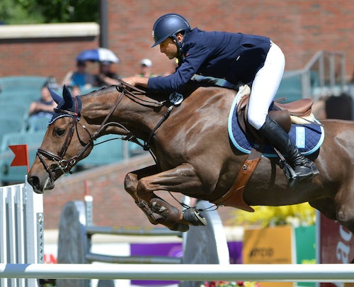 Sameh El Dahan of EGY riding Sumas Zorro during the ATCO Structures and Logistics at the Spruce Meadows National 2014.