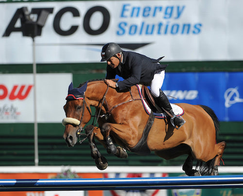 Samuel Parot of CHI riding Couscous van Orti during the ATCO Energy Solutions Cup at the Spruce Meadows North American show jumping tournament.