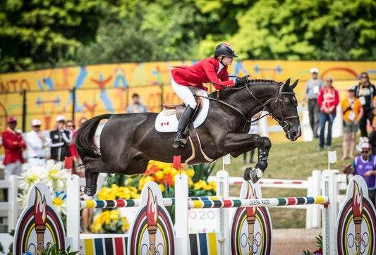 Tiffany Foster (CAN) and TRIPPLE X III at the OLG Caledon Pan Am Equestrian Park during the Toronto 2015 Pan American Games in Caledon, Ontario, Canada.