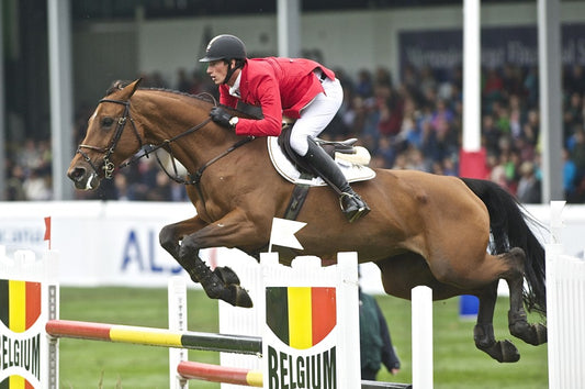 Daniel Deusser and Evita in the BMO Nations Cup at Spruce Meadows as a member of the winning German Team 